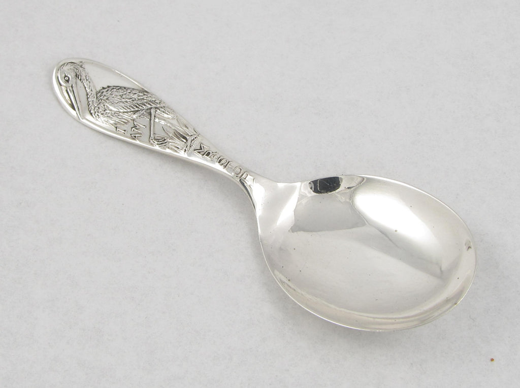 Loop baby spoon in sterling silver.